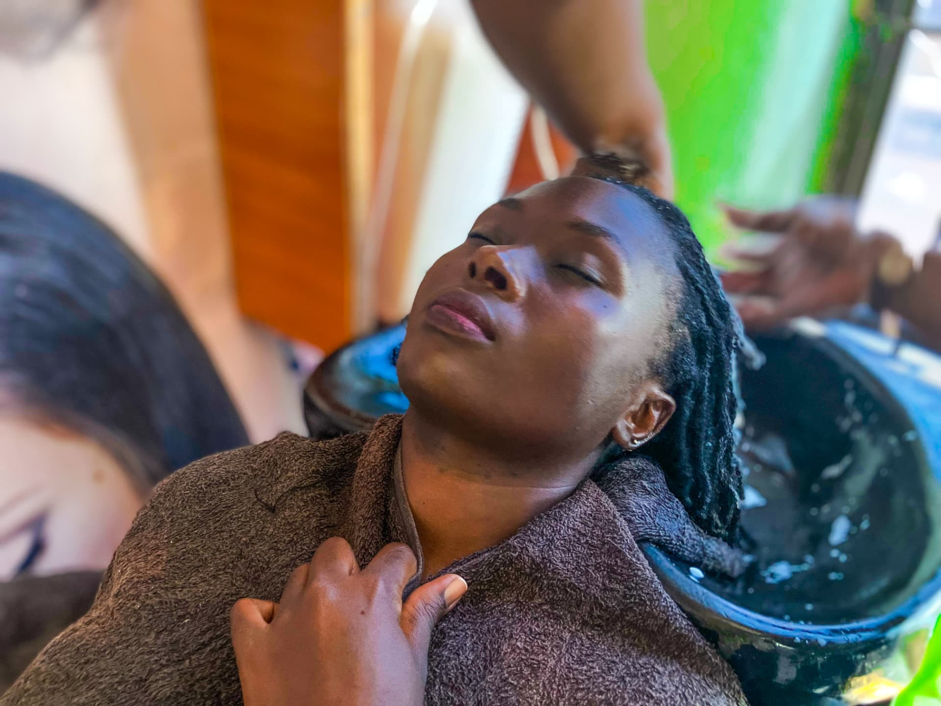 Professional locs wash and scalp care at EleganzaXperience salon in Mbale