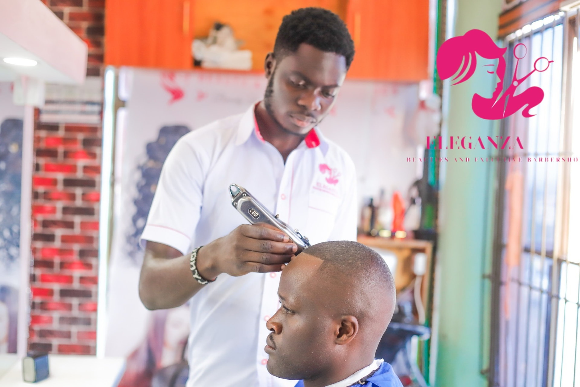 Professional haircut at EleganzaXperience Mbale